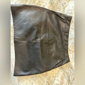 Size Medium; soft in the inside, has pockets